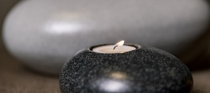 Close up of Eternity Pebble Candle Memorial in home