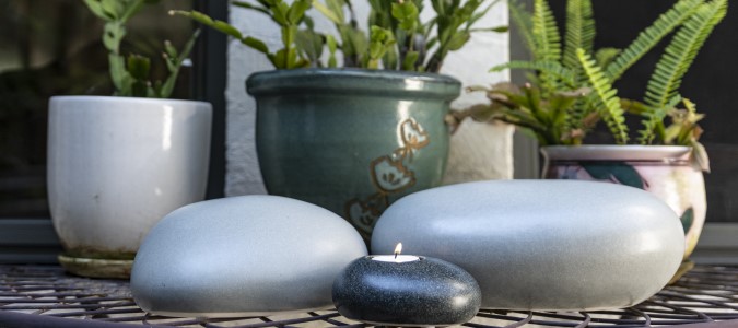 Eternity Pebble XL Adult Urn Set Memorial on DIsplay in a Tranquil Garden